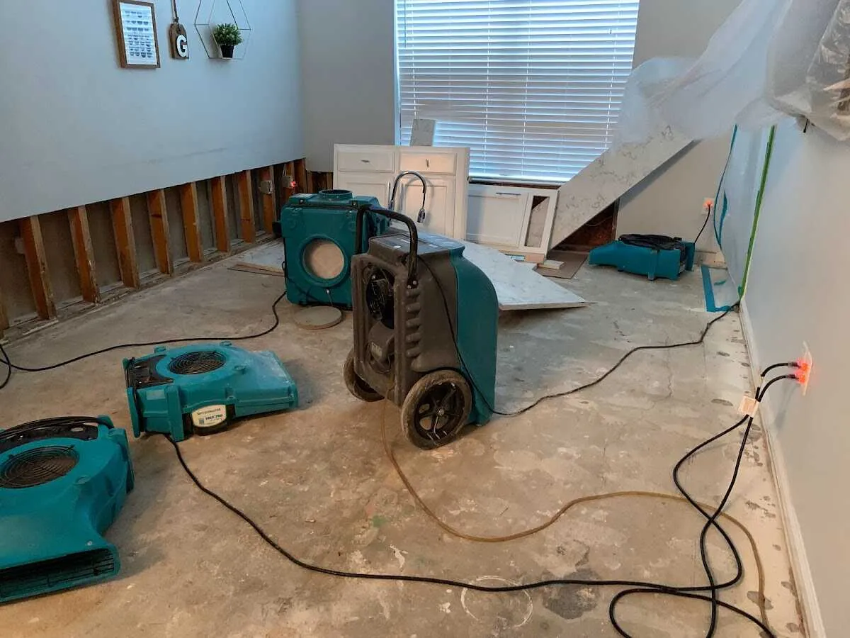 Dehumidifier in flood-cut room for Water Damage Restoration in Cedar Hills